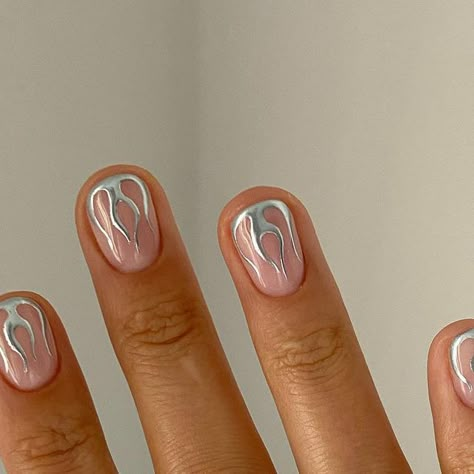 Shelley Graham on Instagram: "GO BIG OR GO CHROME A TGB first! Chrome Pigments have landed️. #AD Iv use Aqua chrome pigment over Daisy studio gel to create these flames. You don’t need long nails to have fun nail art 😜 #chromenails #chromenailart #chromeflames #flamenails #flamenailart #shortnailart #shortnails #biabdolly #thegelbottle #thegelbottleinc #gelpolish #silvernails #nailtrends #tgbpigments #tgb #gelnails #nailart #nailsofinstagram #showscratch #nailitdaily" Short Nails Ideas Flames, Minimal Design Nail Art, Chrome Design Nails Short, Flash Gel Nail Designs, Grey Flame Nails, Short Gel Nail Designs Chrome, Nails For Rave, Nail Art Lightning, Chrome Flames Nails