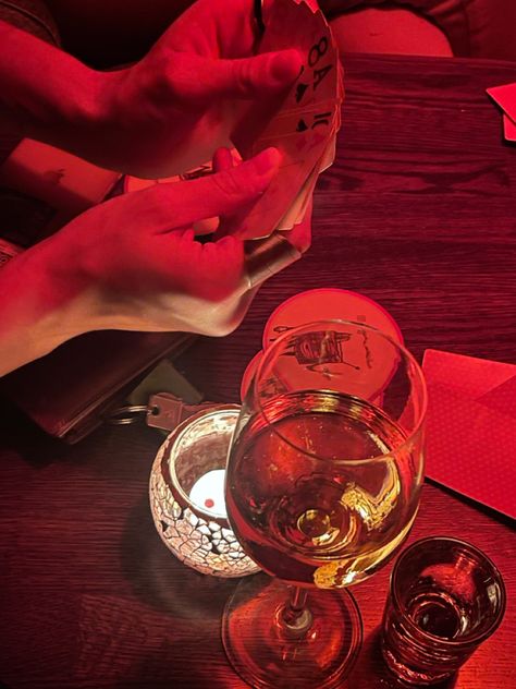 girls night out, club, cards, wine, wine lover, date night, inspo, aesthetic, red light, poker, moody lighting, candles, manly hands, veins Girls Poker Night, Poker Night Aesthetic, Manly Hands, Hands Veins, Poker Aesthetic, Drinking Wine Photography, Wine Gallery, Pretty Poison, Jazz Night