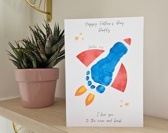 Gift for Dad Handprint Craft, Father's Day, I Love You to the Moon and Back You Rock Daddy Rocket Space 8x10 & 11x14 Size - Etsy Toddlers Fathers Day Cards, Fathers Day Crafts Painting, Father’s Day Hand And Footprint Cards, Baby Footprint Father’s Day Gift, Father’s Day Card Footprint, Footprint Cards For Dad, Dad Arts And Crafts Father's Day, Love You To The Moon And Back Footprint, Foot Print Fathers Day Gifts