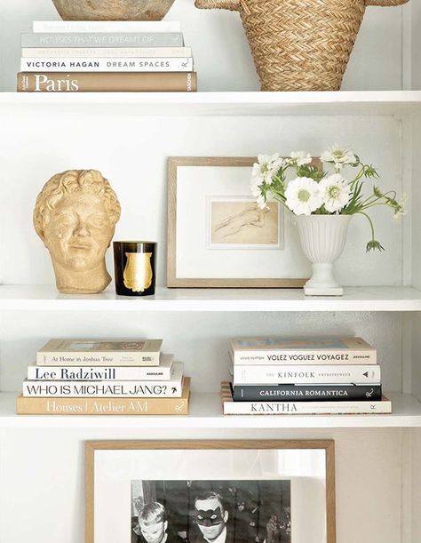 “In all my years of helping clients organize their homes, not once have I had someone call me and regret that they got rid of something. Instead, I constantly hear how free, light, and liberated people feel when they allow themselves to just let go and move forward.” | Photographer: Vivian Johnson | Designer: Chrissy Hunter Minimalist Shelves Decor, Shira Gill, Atelier Am, Minimalist Shelves, Elevate Your Life, Design Books, Shelf Styling, Home Trends, Dream Spaces