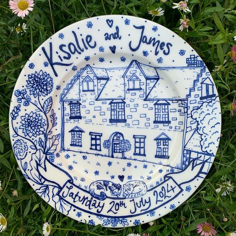 Custom commemorative wedding plate! 💙✨ Designed and handpainted for the lovely @kisalie24 ✨🌙 I’m so excited about this one, I was particularly happy to get to paint two cats ngl ✨🐈 Dark blue on a 20cm Rimmed Plate! I’m obsessed with the blueeeee on ceramics 💙✨ It’s been a crazy two weeks, I have painted SO many plates and I cannot WAIT to reveal them all…. But I can’t show a lot of them yet!! ✨😆 Stay tuned to see many plate reveals in the coming weeks!! Commissions are open! Just Dm me for... Hand Painted Plates Design, Paint Plates Diy, Painted Wedding Plate, Wedding Plate Painting Ideas, Painted Plate Ideas, Diy Ceramic Plate, Celebration Plate, Wedding Plate, Painted Ceramic Plates