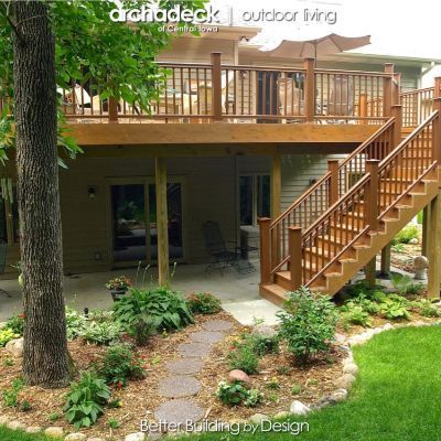 This wooded backyard in Ankeny deserved nothing less than the beauty and durability of TimberTech’s Earthwood Tropical Teak composite decking. Moutain Cedar Radiance Rail. Designed, configured and built by Des Moines premier deck builder, Archadeck of Central Iowa, this deck was featured in a 2010 Better Homes and Gardens Special Publication. Under Deck Landscaping, Deck With Stairs, Patio Under Decks, Deck Landscaping, Patio Installation, Deck Remodel, Under Deck, Backyard Patio Deck, Patio Deck Designs