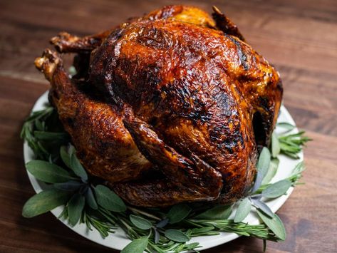 Deep-Fried Turkey Recipe | Alton Brown | Food Network Deep Fried Turkey Recipes, Turkey Rub Recipes, Turkey Rub, Fried Turkey Recipes, Deep Fried Turkey, Dry Rub Recipes, Dry Rubs, Fried Turkey, Alton Brown