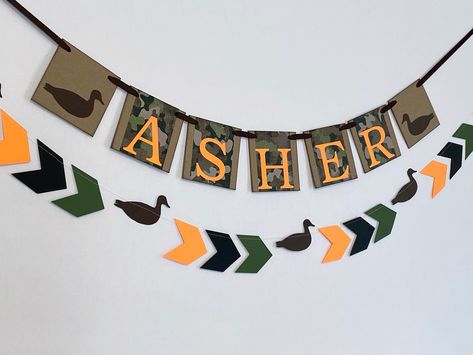 Excited to share the latest addition to my #etsy shop: Duck Hunting Baby Shower Decoration - Mallard 1st Birthday Banner - Camo Birthday Garland - Hunting birthday decorations - #babyshower #anyoccasionbanners #huntingbanner #duckhunting Hunting Themed Birthday Party, Duck Baby Shower Theme, First Birthday Decorations Boy, Camo Birthday, Hunting Birthday, Hunting Baby, Girl Dinosaur Birthday, Dinosaur Birthday Party Decorations, Custom Birthday Banners