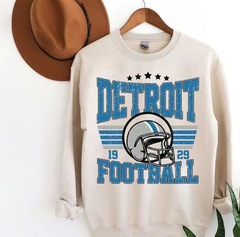 Gameday Couture💙🦁🖤 Our new oversized retro Detroit crewnecks drop today. Grab one now and cheer on your Lions in style! 🏈 #millycate #boutique #lions #detroit, #nflgear #gameday #detroitlions #footballseason #nfl #fashion #style #crewneck #vintage Detroit Lions Hoodie, Darwin Funny, Sunday Football, Vintage Detroit, Football Sweatshirt, Game Day Shirts, Sweatshirt Vintage, Grandparents Day, Football Game