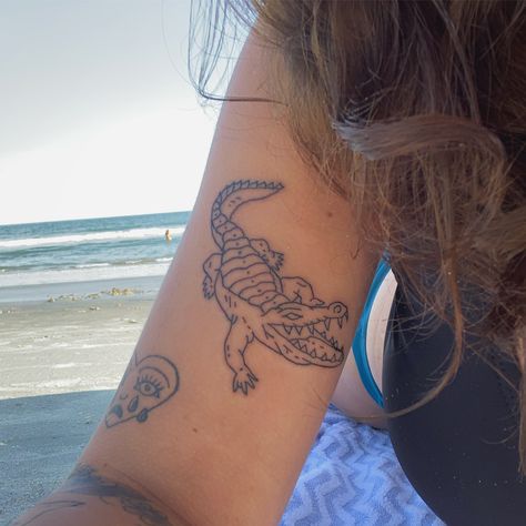 Tattoo Florida Ideas, Alligator Tattoo Cute, Simple Alligator Tattoo, American Traditional Alligator Tattoo, Small Alligator Tattoo, Small Gator Tattoo, Alligator Tattoo Design, Florida Tattoo For Women, Traditional Alligator Tattoo