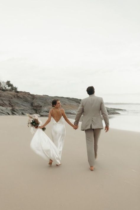 Laid Back Beach Wedding, Modern Elopement Dress, Simple Wedding On The Beach, Wedding Photos By The Sea, Moody Beach Wedding Photography, Small Intimate Wedding Beach, Beach Wedding Pictures In Water, Simple Wedding Elopements, Private Beach Wedding Elope