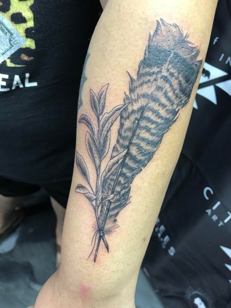 Turkey Feather Tattoo Turkey Tattoo For Women, Feather Tattoos For Women, Turkey Tattoos, Feather Tattoo Ideas, Tattoo Ideas And Meanings, Antler Tattoos, Deer Head Tattoo, Feather Tattoo Colour, Feather Tattoo Meaning