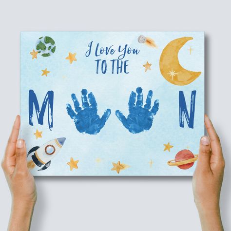 My BESTSELLING handprint craft, now beautifully printed for you on 11x14" canvas. A unique and creative way to cherish those little hands- which won't stay little for long! This "I Love You To The Moon" canvas with a whimsical, watercolor space scene will be shipped to you WITHOUT handprints on it so that your child can add 2 painted handprints directly onto the canvas. This way, you can personalize it yourself with original handprints from your child.  (See detailed crafting instructions below) Crafts To Make For Grandparents, Patriotic Handprint Art, Art Activities For One Year Olds, Toddler Hand Painting Ideas, Dad Canvas From Kids, Kids Handprint Art For Dad, Footprint Art For Grandma, Diy Crafts For Dads Birthday, Grandparent Toddler Craft