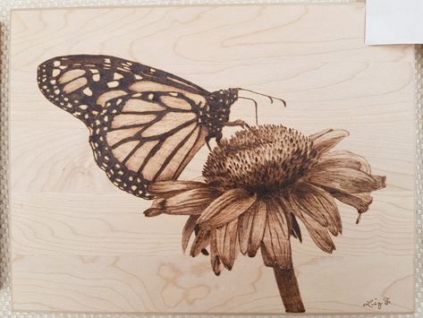 Pyrography monarch butterfly on flower Pyrography Flower Patterns, Butterfly Pyrography, Sunflower Pyrography, Flower Pyrography, Pyrography Flowers, Monarch Butterfly On Flower, Wood Staining Techniques, Beginner Wood Burning, Wood Burning Patterns Stencil