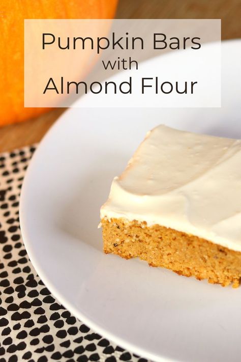 A healthy pumpkin bar on a white plate with a pumpkin in the background. Paleo Pumpkin Bars, Healthy Pumpkin Bars, Almond Flour Desserts, Gluten Free Pumpkin Bars, Wheat Belly Recipes, Gluten Free Bars, Paleo Recipes Dessert, Paleo Baking, Pumpkin Bars