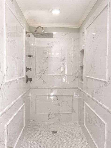 Marble tile Marble Shower With Chair Rail, Bathroom Marble Herringbone Floor, Shower With Chair Rail Tile, Marble Chair Rail Bathroom, Herringbone Master Bath, Classic Marble Bathroom, Herringbone Floor Bathroom, Herringbone Shower Floor, Primary Ensuite