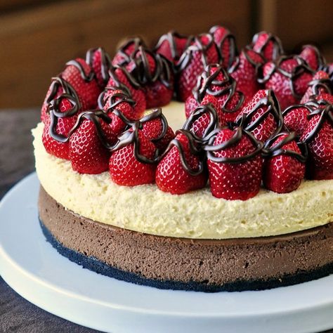 Double Decker Neapolitan Cheesecake - Our 1000th Recipe! A vanilla and a chocolate cheesecake in one, topped by fresh strawberries and a drizzle of chocolate ganache. Celebration Desserts, Rock Recipes, Gateaux Cake, Creamy Chocolate, Creamy Cheesecake, Yummy Desserts, Chocolate Baking, Newfoundland, Let Them Eat Cake