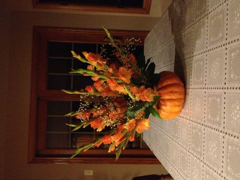 To make this floral arrangement: Cut the top off the pumpkin and clean out the… Pumpkin On A Stick, Pumpkin Floral Arrangements, Greenery Arrangements, Halloween Floral, Fall Flower Arrangements, Pumpkin Flower, Flower Display, Halloween Deco, Fall Floral