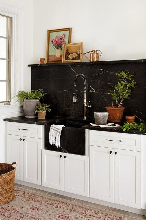 An antique beige and red runner sits in front of white mudroom cabinets adorned with oil rubbed bronze hardware and a honed black marble countertop. Black Marble Countertops, Black Kitchen Countertops, Marble Tile Backsplash, Marble Backsplash Kitchen, Mudroom Cabinets, Best Kitchen Design, Black Backsplash, Marble Countertops Kitchen, Marble Home