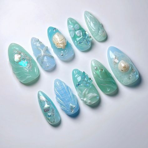 🩵 Aquamarine 🪸 I wanted to create a vibe that makes you think of the ocean 🐠 custom design for my own press ons to wear this summer with my favourite blue+green shades 🫧 you can place an order for press ons at janetsnails.com ✨ #naildesign #3dnailart #3dnails #summernails #nailinspo #gelxinspo #chromenails #fairycorenails #mermaidnails #shellnails #beachnails #naturenails #nails2inspire #pressonnails #pressons #vancouvernails #gelxnails Turquoise Mermaid Nails, Green Ocean Nails, Green And Blue Nail Ideas, Green Beach Nails, Aquamarine Nails Design, Aqua Nail Designs, Blue And Green Nails Designs, Ocean Nails Sea, Green Blue Nails