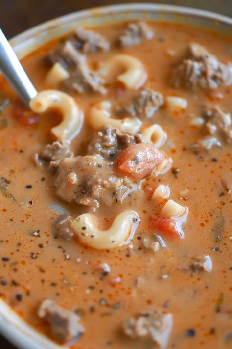 Comforting Creamy Beef and Tomato Soup is a rich, hearty dish with beef, tomatoes, and cream cheese. Ready in just 40 minutes! Beef And Tomato Soup, Beefy Tomato Soup Recipe, Hamburger Macaroni Soup, Tomatoes And Cream Cheese, Ground Beef Cream Cheese, Hamburger Macaroni, Soup Sunday, Cheese Noodles, Macaroni Soup