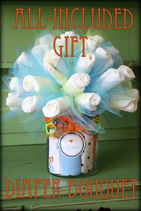 Like Mom and Apple Pie: Baby Shower Gift-Diaper Bouquet DIY and Tutorial- burp cloths in vase and rattle for the "bow" Diaper Bouquet Diy, Diaper Bouquet Tutorial, Boy Bouquet, Baby Shower Bouquet, Pamper Cake, Diaper Bouquet, Baby Bouquet, Diaper Gifts