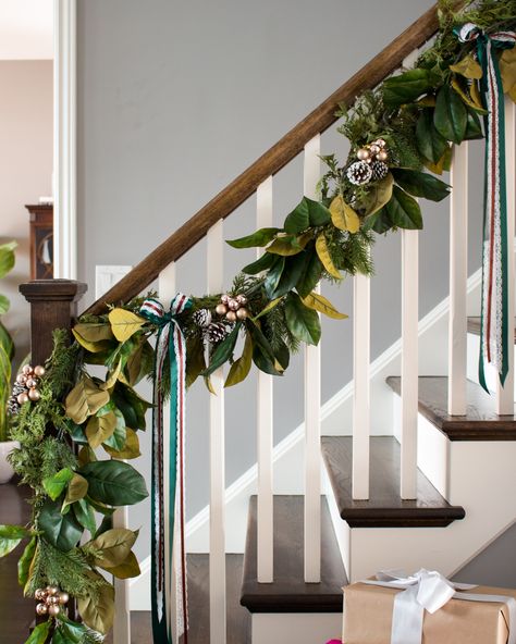 magnolia garland with cognac and emerald green ribbon Holiday Staircase, Farmhouse Christmas Garland, Banister Garland, Garland Staircase, Christmas Garland Staircase, Staircase Garland, Christmas Banister, Magnolia Garland, Christmas Stairs