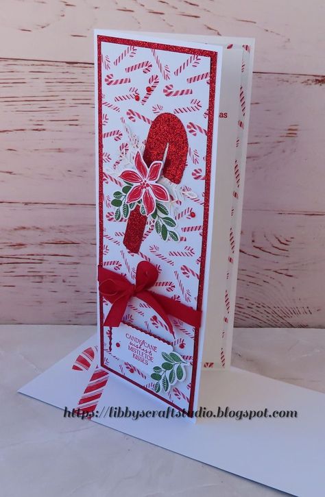 TGIF Challenge #392 - What would you do without BLACK ink?  For my slimline card I used the Stampin' Up! Sweet Candy Canes bundle, Merriest Moments stamp set and Sweetest Christmas DSP.  The Real Red Glimmer Paper and ribbon really jazzed up my card nicely.
Visit my blog for more details. Stampin Up Sweet Candy Canes, Sweetest Christmas Dsp, Sweet Candy Canes, Merriest Moments, Mistletoe Kiss, Sweet Christmas, Sweet Candy, Candy Canes, Tgif