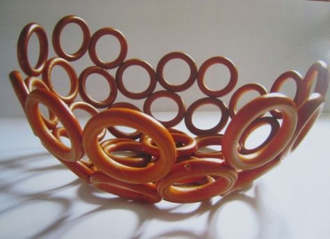 DIY bowl made of rings— wooden curtain rings in this case. great fruit bowl or foyer vessel, coffee table or book case sculpture, that would look cool in off-white or a metallic. or glossy red, cobalt blue. pale pink for a mod girly bedroom… Curtain Rings Crafts, Diy Fruit Bowl, Wooden Rings Craft, Wooden Curtain, Blue Velvet Chairs, Shower Rings, Diy Bowl, Wood Curtain, Ring Bowl