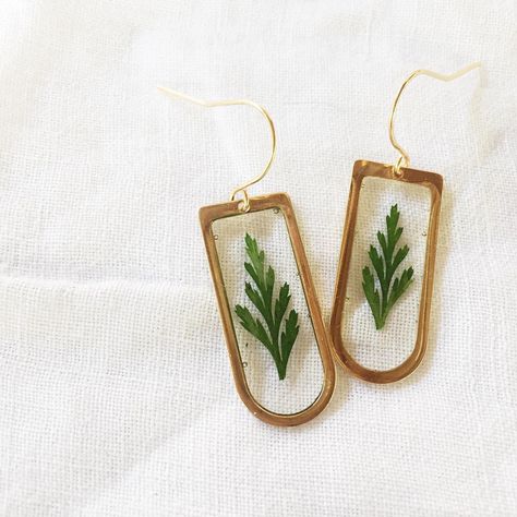 🌿Restocked lots of these cuties today! 🌿SHOP LINK IN BIO! . . . . .  #allthingsbotanical #fernearrings #shopsmall #buyhandmade #handmadehour #liveauthentic #thatauthenticfeeling #creativityfound #supporthandmade #makelivesell #makersmovement #supportsmallbusiness #psimadethis #craftsposure #instagoods #bohoearrings #creativelifehappylife #realpressedflowers #positivevibe #girlgetoutside #handmadewithlove #bohochicstyle #bohoearrings #goodvibesonly #grabbagbotany #resinearrings #minimalistjewel Friend Gifts Birthday, Fern Earrings, College Grad Gifts, Daughter Best Friend, Terrarium Jewelry, Botanical Earrings, Botanical Jewelry, Friend Gifts, Gift For Daughter