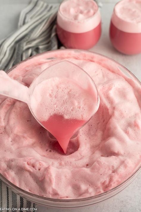 Close up image raspberry sherbet punch in a punch bowl with a serving on a ladle. Punch Pink, Strawberry Ice Cream Punch, Non Alcoholic Wedding Punch, Punch With Sorbet, Punch Bowl Punch Recipes, Bridal Punch, Pink Drinks For Party, Pink Sorbet Punch, Diy Punch Bowl Ideas