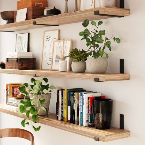 Floating shelf above bed