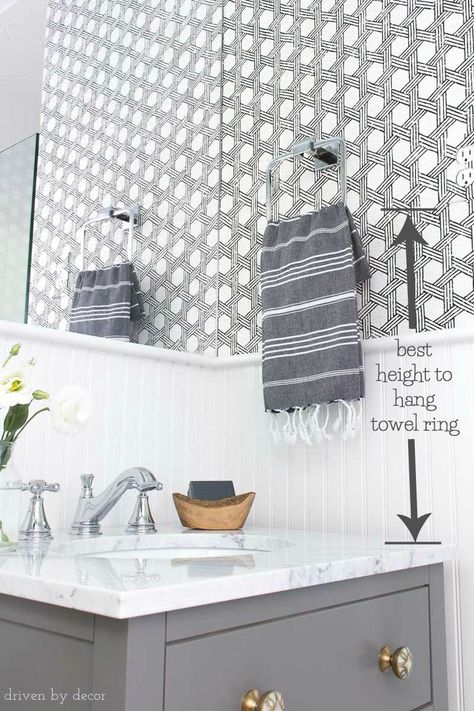 Great tip for how high to hang a towel ring in your bathroom. Check out all of the other helpful bathroom measurements included in this post! Towel Bars In Bathroom, Towel Bar Height, Bathroom Measurements, Bathroom Hand Towel Holder, Bathroom Towel Ring, Driven By Decor, Decorating Bathroom, Bad Inspiration, Hand Towels Bathroom