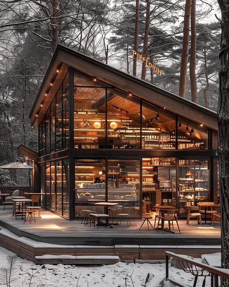 Snowy Haven Café by Maedeh Hemati @mah_design_architecture. 🔗 https://www.amazingarchitecture.com/visualization/snowy-haven-cafe-by-maedeh-hemati Maedeh Hemati: Indulge in the serene charm of this coffee shop, designed in the distinctive style of Philip Johnson architecture. The gray wood and glass facade, captured in a mesmerizing close-up shot, invites you into a world of warmth and elegance. Nestled amidst an outdoor snowy forest, the natural light filters through the glass panels, creat... Philip Johnson Architecture, Rustic Coffee Shop, Forest Cafe, Wood Cafe, Glass Facade, Rustic Cafe, Small Coffee Shop, Restaurant Exterior, Shop Facade