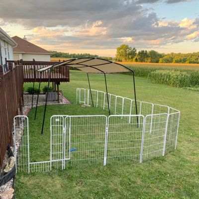 Our dog play fence is made of heavy metal material, strong and durable. The dog fence itself has beautiful, firm, smooth, and anti-rust functions. It is enough for you to use for a long time, and each fence is connected with a pin, which can fix the fence and make it easy to move. Color: White, Size: 23.6" H | Aaronam Outdoor Safe Portable Dog Playpen Barrier Exercise Pet Pen (8 Panels) Metal | 252 W x 1 D in | Wayfair Temporary Fencing For Dogs, Temporary Dog Fence Ideas, Temporary Fence Ideas, Temporary Dog Fence, Rv Dog Fence, Temporary Fence For Dogs, Portable Dog Fence, Rv Dog, Pet Pen