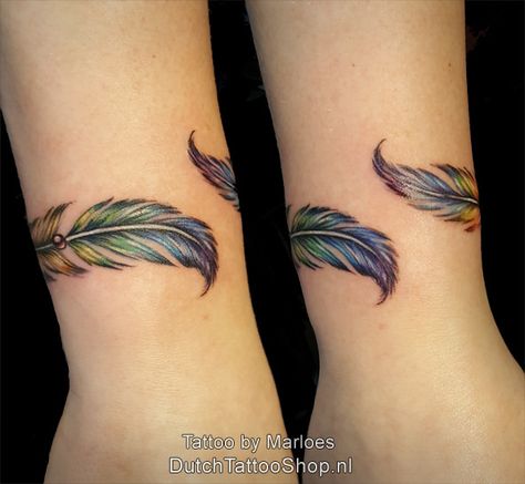 rainbow-feather-regenboog-veer-armband ... Native American Feathers Tattoo, Feather Band Tattoo, Feather And Flowers Tattoo, Feather Bracelet Tattoo, Feather Ring Tattoo, Feather Wrist Tattoos For Women, Wrap Tattoo Ideas, Feather Wrist Tattoo, Meaning Of Feather Tattoo