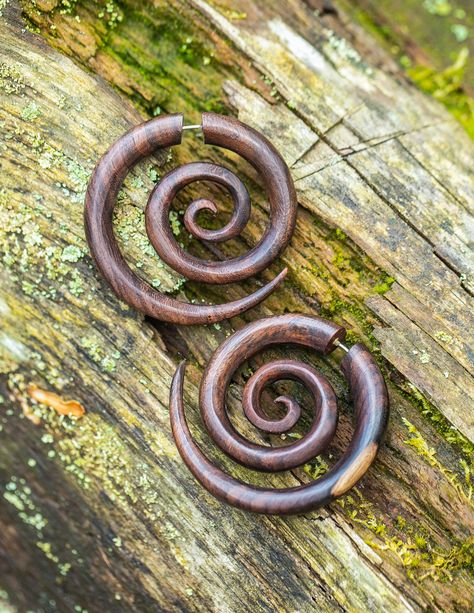 # High Quality Carved Wood # Robust # For Regular Pierced Earrings # Sold as Pair Faux Gauges More payment options This Super Spiral Fake Gauge is a large size earring that looks like a 12mm gauge expander. It is a WONDERFUL piece, totally reminiscent of the tribal style, authentic and irreverent! It allies with the energy of the wild woman archetype who lives within us and is the representation of ancestry in a jewelry. If this is for you, take the opportunity today to take it home, because our Spiral Gauges, Spiral Septum, Nose Peircing, Faux Gauges, Fake Gauge Earrings, Fake Gauges, Septum Piercing, Wild Woman, Gauged Earrings