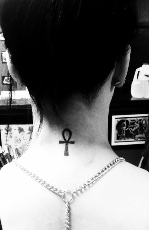 My first tattoo. An Ankh. It's an Ancient Egyptian symbol meaning eternal life. The gods pressed them to the lips of the worthy for the breath they would need in the after life. Eternal Life Tattoo, Life Symbol Tattoo, Tattoo Espalda Mujer, Back Of Neck Tattoos For Women, Buddhist Tattoos, Playboy Tattoo, Watermelon Tattoo, Nefertiti Tattoo, Ankh Tattoo