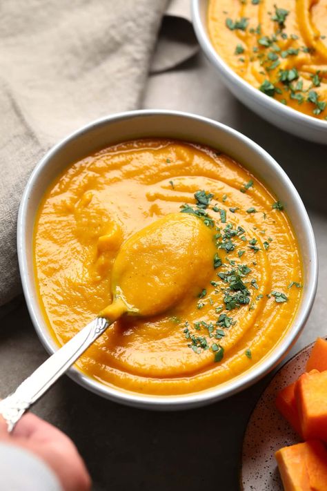 This vegan Butternut Squash and Sweet Potato Soup is an easy and wholesome fall side dish that’s ready in about 1 hour. Curl up with a bowl when it’s cold out or bring it to Thanksgiving dinner! Butternut Squash And Sweet Potato Soup, Squash And Sweet Potato Soup, Butternut Squash And Sweet Potato, Butternut Squash Sweet Potato, Vegan Mushroom Soup, Nora Cooks, Butternut Squash Sweet, Vegan Butternut Squash Soup, Vegan Pumpkin Soup