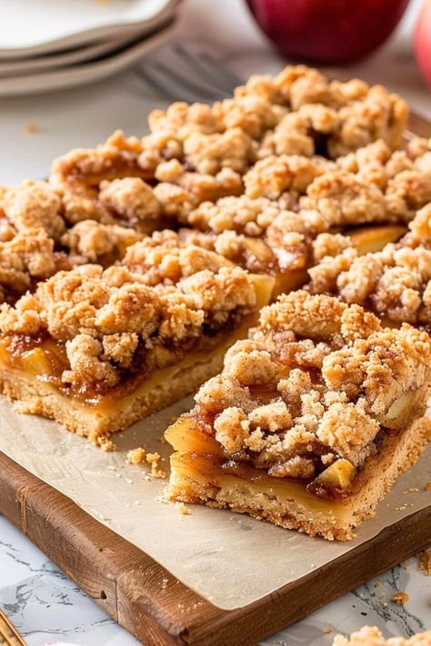 Caramel Apple Shortbread Crumble Bars, Crumble Apple Pie Cookie, Caramel Apple Streusel Bars, Shortbread Crumble Topping, Apple Strudel Bars, Apple Pie Brownies, Cafe Baked Goods Ideas, Apple Crisp Shortbread Bars, Apple Pie Crumble Bars