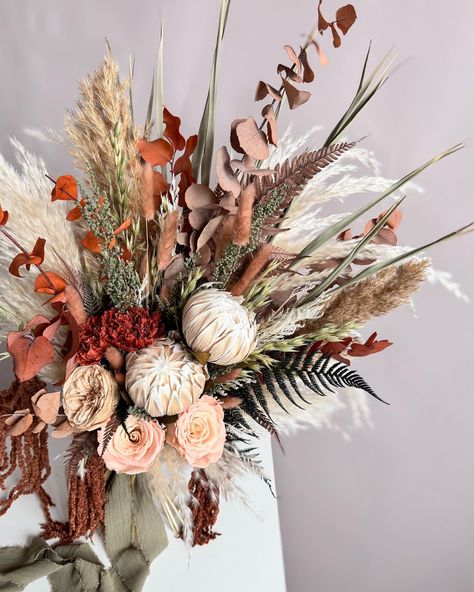 Magic dried flowers and preserved flowers bouquet 💐 . . #dried #driedbouquet #driedflowers #weddingcenterpiece #driedcenterpiece #centerpiece #drieddecor #driedcenterpieces #driedarragaments #modernhomedecor #interior #interiordecorating #driedpalms #neutraldecor #driedflowerconposition #driedflowerdecor #instaflowers #pampass #preservedroses #preserveddecor #centerpieces #weddingdecor #driedweddingdecors Rustic Bridal Bouquet, Preserved Flowers Bouquet, Terracotta Flowers, Spring Wedding Bouquet, Dried Bouquet, Bouquet Flower, Preserved Roses, Groom Boutonniere, Rustic Bridal