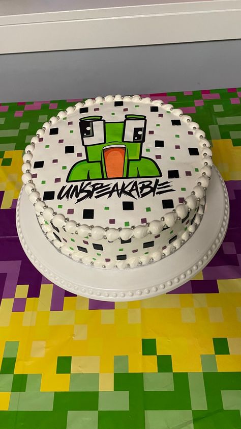 Edible image of Unspeakable logo with fondant squares on buttercream icing Unspeakable Birthday Party Ideas, Unspeakable Birthday Cake, Unspeakable Birthday Party, Unspeakable Cake, Birthday Drip Cake, Minecraft Party Decorations, Blaze Birthday, Lego Birthday Cake, Cole Baby