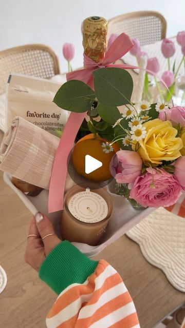 Deborah Trette on Instagram: "save your drive through drink carriers! & add a bottle of bubbly, chocolate, flowers, a candle + dish towel for the perfect hostess gift this summer! I also included an orange for mimosas! 🍊

save and share! 🔗 under @shop.ltk

#diygifts #giftidea #giftforher #hostessgift #hostess #teachergifts #summergift #dinnerparty #targetfinds" Drink Carrier Gift Ideas, Baby Shower Hostess Gift Ideas, Bubbly Chocolate, Baby Shower Hostess Gifts, Gift Instagram, Shower Hostess Gifts, Hostess Gift Ideas, Water Gift, Drink Carrier