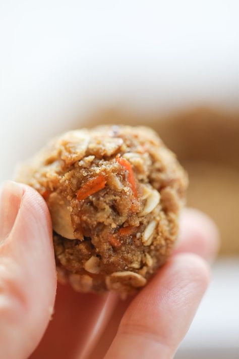 protein bite in hand Carrot Cake Protein, Carrot Cake Balls, Oatmeal Bites, Cookie Dough To Eat, Low Calorie Protein, Afternoon Slump, Healthy Carrot Cakes, Carrot Cake Oatmeal, Peanut Butter Roll