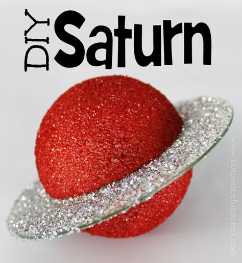 This sparkly and gorgeous Saturn is made from a foam ball and a CD. How cool is that? If you're a fan of the cosmos you can easily see how you could make an entire universe this way! Saturn is extra cool though... due to the ring and all. It can be hung or placed on a simple wood stand as shown. Diy Saturn Planet Project, Planet Ornaments Diy, 3d Planet Project, Planet Projects For Kids, Saturn Project, Solar System Projects For Kids, Planet Crafts, Planet Project, Solar System Model