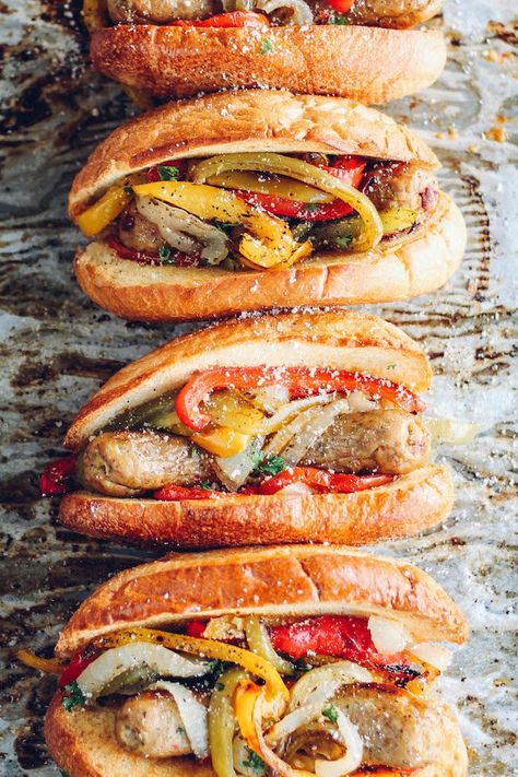 Sheet Pan Sausage and Pepper Hoagies | Destination Delish - sweet peppers, caramelized onions, and chicken sausage tucked inside a toasted bun. Sheet pan dinner perfection! Sausage And Peppers On A Bun, Chicken Sausage Hot Dog, Chicken Sausage Sandwich Recipes, Chicken Sausage Sandwich, Chicken Sausage Wrap, Sausage And Pepper Hoagies, Sheet Pan Sausage, Pan Sausage, Sausage Sandwich