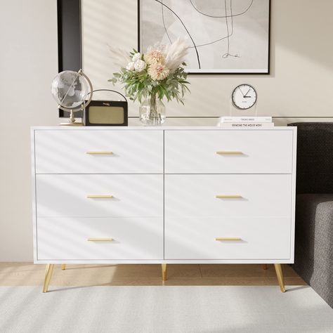 PRICES MAY VARY. PLEASE NOTE: If the drawers cannot be pushed in after assembly, please change the left and right positions of the drawers. 【⭐White Dresser for Bedroom】Elegant rectangular white dresser with gold handles for mid-century modern style. The classic white dresser can be paired with a variety of decor styles and become the highlight of the bedroom. 【⭐6 Drawer Dresser for Storage】The dresser with 6 spacious drawers adds extra storage to the bedroom to organize your clothes, socks, blan White And Gold Dresser, Wood Chest Of Drawers, Modern Dressers, Gold Dresser, Dresser For Bedroom, 7 Drawer Dresser, Wooden Dresser, White Dresser, Chests Of Drawers