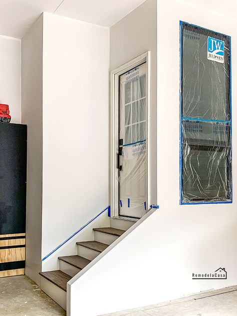 How to build and install staircase in garage - mudroom - #thdprospective Garage House Entry, Mudroom In Garage Diy, Stairs From Garage To House, Build A Mudroom In Garage, Steps In Garage To House, Framing A Mudroom In Garage, Add Mudroom To Garage, Laundry Room Addition In Garage, Build Mudroom In Garage