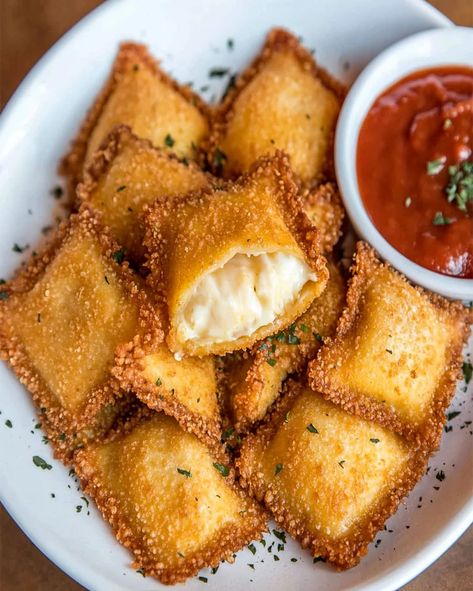 Fried Ravioli Recipe - Easy, Crispy Appetizer Perfect for Parties Crispy Ravioli Appetizer, Fried Ravioli Appetizer, Fried Ravioli Recipe Frozen, Sausage Ravioli Recipe, Fried Ravioli Recipe, Sausage Ravioli, Fried Ravioli, Homemade Ravioli, Elegant Appetizers