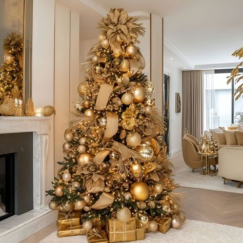 Transform your Christmas tree with gold tones and velvet ribbons. Add lights and ornaments for a luxe finish. Christmas Tree With Gold Ornaments, Gold Christmas Tree Decor, Gold Christmas Tree Ideas, Gold Christmas Tree Decorations, Christmas 2025, Christmas Tree Decorations Diy, Gold Glam, Christmas D, Christmas Tree Ideas