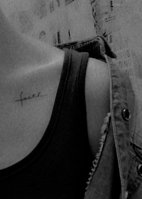 Black and white sexy cute collarbone word tattoo faith Faith Tattoo Collarbone, Word Tattoos Collar Bone, Dainty Clavicle Tattoos, Faith Collar Bone Tattoo, Collarbone Small Tattoo, Tattoos For Collarbone, Collarbone Word Tattoo, Collar Bone Word Tattoo, Tattoo On Collarbone