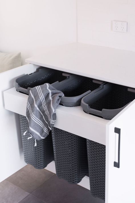 Hack your own pull-out laundry hamper - Style Curator Laundry Basket Under Bathroom Vanity, Tip Out Laundry Hamper, Bathroom Clothes Basket, Laundry Basket Closet Ideas, Diy Hamper Laundry, Laundry Baskets In Bathroom, Diy Hidden Laundry Hamper, Pull Out Laundry Basket, Pull Out Laundry Hamper