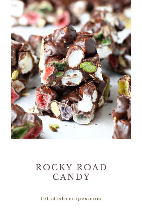 Rocky Road Candy Recipe -- Traditional rocky road candy, made with chocolate, nuts and marshmallows, gets an upgrade for the holidays with the addition of gummy candy. So easy to make, this candy will quickly become a holiday favorite! #holidaytreats #christmascandy Holiday Rocky Road Nyt, Holiday Rocky Road, Rocky Road Candy Recipe, Holiday Desserts Halloween, Rocky Road Candy, Rocky Road Bars, Snickers Candy Bar, Snickers Candy, Breakfast Bread Recipes