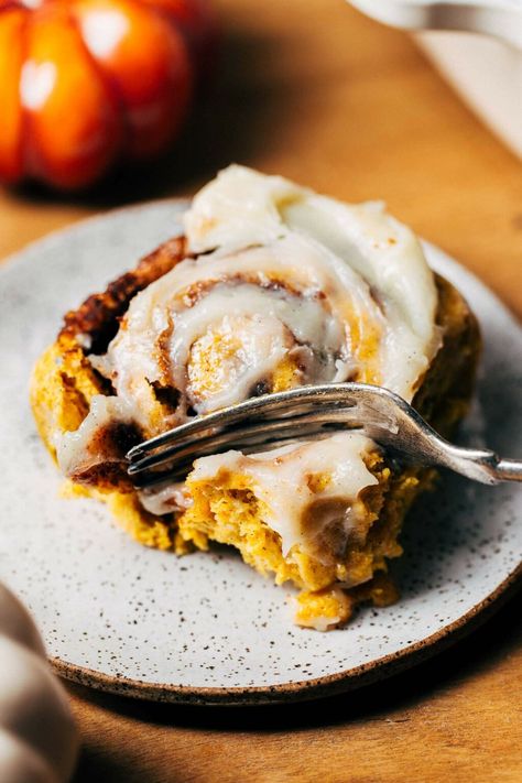 These pumpkin cinnamon rolls are so soft and fluffy with a pumpkin dough and pumpkin butter filling. With flavors of pumpkin spice, cinnamon, and vanilla bean cream cheese frosting, these pumpkin cinnamon rolls are the coziest fall treat! #pumpkinspice #pumpkin #cinnamonrolls #butternutbakery | butternutbakeryblog.com Pumpkin Dough, Vanilla Bean Cream, Caramel Apple Desserts, Butternut Bakery, Cinnamon Roll Dough, Pumpkin Spice Recipe, Pumpkin Cinnamon Rolls, Breakfast Recipes Sweet, Pumpkin Desserts